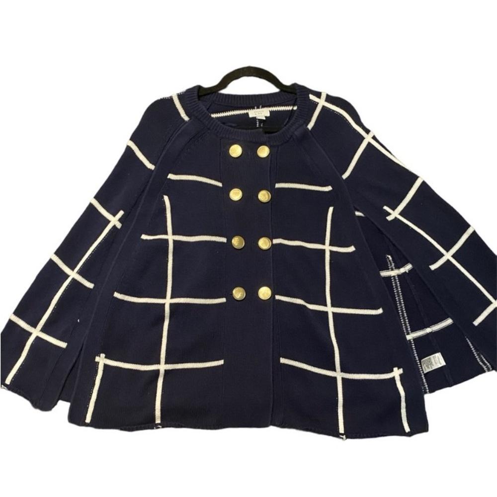 Navy Blue and White Poncho. One Size fits all. New condition, Never Worn.